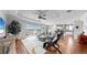 Spacious living room with hardwood floors, sliders to lanai and a view of the lake at 11101 58Th Street E Cir, Parrish, FL 34219