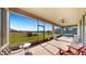 Relaxing screened porch overlooking a pond and backyard at 11101 58Th Street E Cir, Parrish, FL 34219