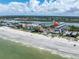 Aerial view of beachfront property, showing location and proximity to beach and other buildings at 19807 Gulf Blvd # 128, Indian Shores, FL 33785