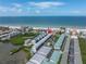 Aerial view highlighting the property's proximity to the ocean at 19807 Gulf Blvd # 128, Indian Shores, FL 33785