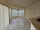 Bright dining area with tile flooring and window seating at 2421 E Del Webb Blvd, Sun City Center, FL 33573