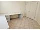 Home office with built-in desk and double door closet at 2421 E Del Webb Blvd, Sun City Center, FL 33573
