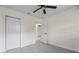 Bright bedroom with ceiling fan and ample closet space at 3612 W Leila Ave, Tampa, FL 33611