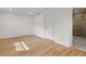 Bright bedroom with wood floors and ensuite bathroom at 3612 W Leila Ave, Tampa, FL 33611