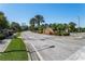 Welcoming community entrance with lush landscaping and signage at 4911 Diamonds Palm Loop, Wesley Chapel, FL 33543