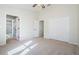 Spacious bedroom with double doors leading to bathroom at 496 Palm Ave, Palm Harbor, FL 34683