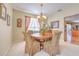 Elegant dining room with a round table and four chairs at 5315 Cedarshake Ln, Valrico, FL 33596