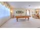 Bright game room featuring a pool table and large windows at 5315 Cedarshake Ln, Valrico, FL 33596