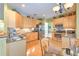 Modern kitchen with stainless steel appliances and hardwood floors at 5315 Cedarshake Ln, Valrico, FL 33596