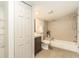 Clean bathroom with tub, toilet, and vanity at 6317 S Lansdale Cir, Tampa, FL 33616