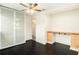 Bedroom with built-in desk and large closet at 6317 S Lansdale Cir, Tampa, FL 33616