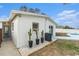 White house exterior with cacti and a pool at 6317 S Lansdale Cir, Tampa, FL 33616