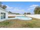 Oval shaped pool in backyard at 6317 S Lansdale Cir, Tampa, FL 33616