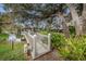 Wooden footbridge leads to gazebo over tranquil water at 943 Lucas Ln, Oldsmar, FL 34677