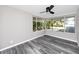 Spacious bedroom with large windows and gray vinyl flooring at 10214 66Th Ave, Seminole, FL 33772