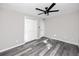 Bedroom with double door closet and ceiling fan at 10214 66Th Ave, Seminole, FL 33772