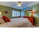 Comfortable bedroom with a queen-size bed and a dresser at 390 Cypress Creek Cir, Oldsmar, FL 34677