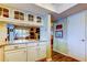 Kitchen with granite countertops and white cabinets at 390 Cypress Creek Cir, Oldsmar, FL 34677