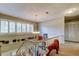 Upstairs hallway with large windows, chandelier, and unique decor at 390 Cypress Creek Cir, Oldsmar, FL 34677