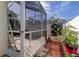 Landscaped backyard with a wooden fence and plants at 8622 Thimbleberry Ln, Tampa, FL 33635