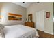 Spacious bedroom with king-size bed, dresser, and closet at 8622 Thimbleberry Ln, Tampa, FL 33635