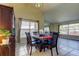 Bright dining area with wood table and chairs at 8622 Thimbleberry Ln, Tampa, FL 33635