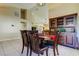 Dining room with wood table, chairs and hutch at 8622 Thimbleberry Ln, Tampa, FL 33635