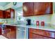 Granite countertops and stainless steel appliances in this kitchen at 8622 Thimbleberry Ln, Tampa, FL 33635