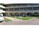 Building exterior showcasing walkway and landscaping at 2462 Brazilia Dr # 20, Clearwater, FL 33763
