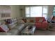 Spacious living room featuring a large sectional sofa at 2462 Brazilia Dr # 20, Clearwater, FL 33763