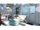 Relaxing patio area with seating and grill at 2462 Brazilia Dr # 20, Clearwater, FL 33763