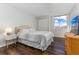 Bright bedroom with a double bed, nightstand and dresser at 660 Island Way # 908, Clearwater Beach, FL 33767