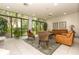 Relax in this spacious common area with comfortable seating and natural light at 660 Island Way # 908, Clearwater Beach, FL 33767