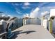 Private dock with dolphin statue, offering scenic waterfront views at 660 Island Way # 908, Clearwater Beach, FL 33767