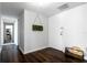 Bright entryway with hardwood floors and mirrored closet at 660 Island Way # 908, Clearwater Beach, FL 33767