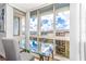 Home office with glass desk and water views at 660 Island Way # 908, Clearwater Beach, FL 33767