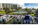 Community pool with surrounding patio and lush landscaping at 660 Island Way # 908, Clearwater Beach, FL 33767