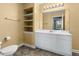 Bright bathroom with white vanity, tile floor, and built-in shelving at 345 Bayshore Blvd # 308, Tampa, FL 33606