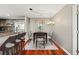 Elegant dining area with hardwood floors and a modern chandelier at 345 Bayshore Blvd # 308, Tampa, FL 33606