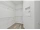 Spacious walk-in closet with wire shelving and ample storage at 9442 Shorebird Ct, Parrish, FL 34219