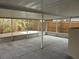 Large screened porch with concrete flooring at 5337 Treig Ln, Wesley Chapel, FL 33545