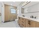 Modern bathroom with double vanity and large shower at 623 15Th Nw Ave, Largo, FL 33770