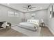 Main bedroom with large bed, sitting area, and hardwood floors at 623 15Th Nw Ave, Largo, FL 33770