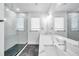 Spa-like bathroom with marble shower and double vanity at 2608 W Columbus Dr # 3, Tampa, FL 33607