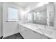 Modern bathroom with double vanity and walk-in shower at 2608 W Columbus Dr # 3, Tampa, FL 33607