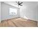 Bright bedroom with hardwood floors and ceiling fan at 2608 W Columbus Dr # 3, Tampa, FL 33607