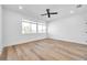 Bright bedroom with hardwood floors and large window at 2608 W Columbus Dr # 3, Tampa, FL 33607