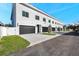 Modern townhome building with white exterior and black accents at 2608 W Columbus Dr # 3, Tampa, FL 33607