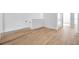 Light and bright hallway with hardwood floors at 2608 W Columbus Dr # 3, Tampa, FL 33607