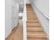 Modern staircase with light wood treads and white risers at 2608 W Columbus Dr # 3, Tampa, FL 33607